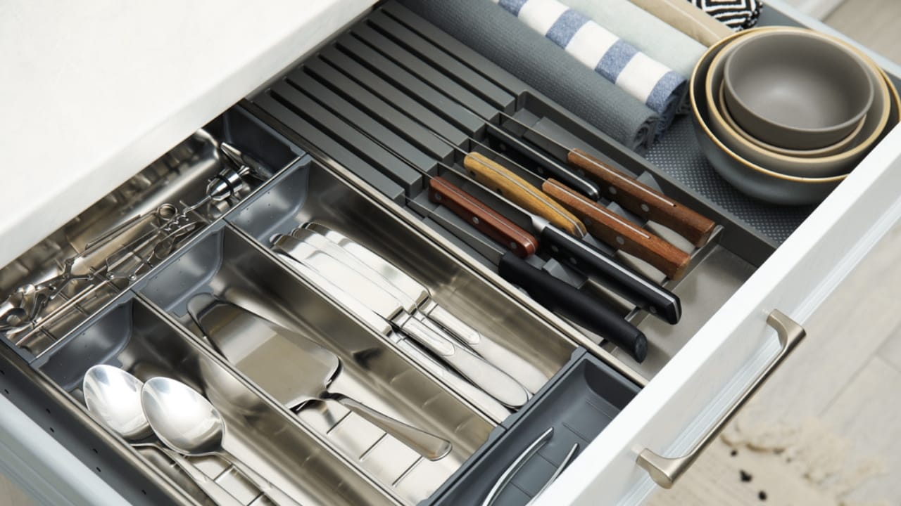 10 Things You Should Never Store in Low Kitchen Cabinets - knife in cabinet dp599317182
