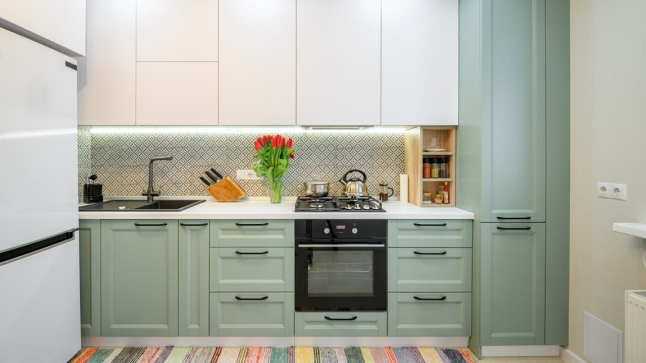 Why Designers are Raving About Kate Hudson's Kitchen Cabinets 3 Why Designers are Raving About Kate Hudson's Kitchen Cabinets - light green kitchen cabinet ss1943884246