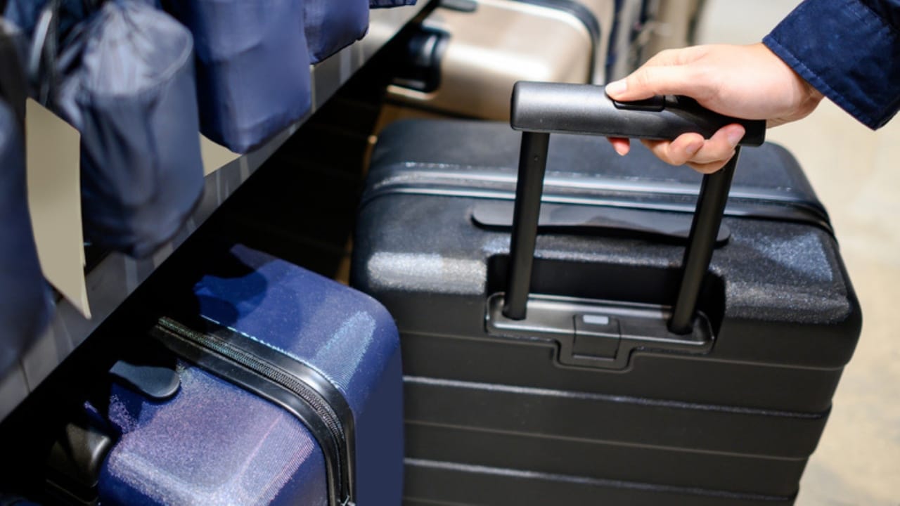 Quality Over Quantity: 20 Home Essentials You Should Never Scrimp On 10 Quality Over Quantity: 20 Home Essentials You Should Never Scrimp On - man choosing luggage dp554452842