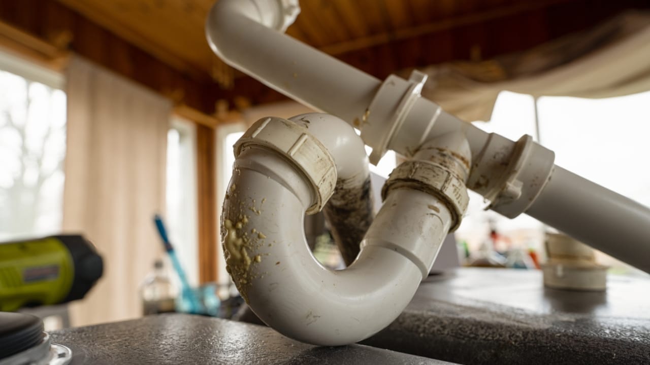 Kitchen Sink Odors? Here’s What’s Causing Them & How to Get Rid of It - p trap ss1888398763