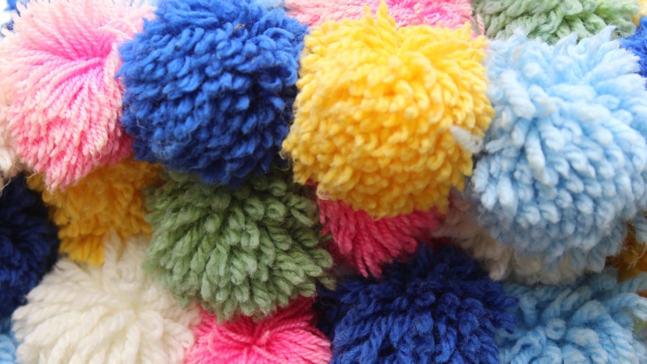 Don’t Toss That Yarn: 15 Creative Uses for Your Leftover Scraps 3 Don’t Toss That Yarn: 15 Creative Uses for Your Leftover Scraps - pom pom yarn ss1807662160