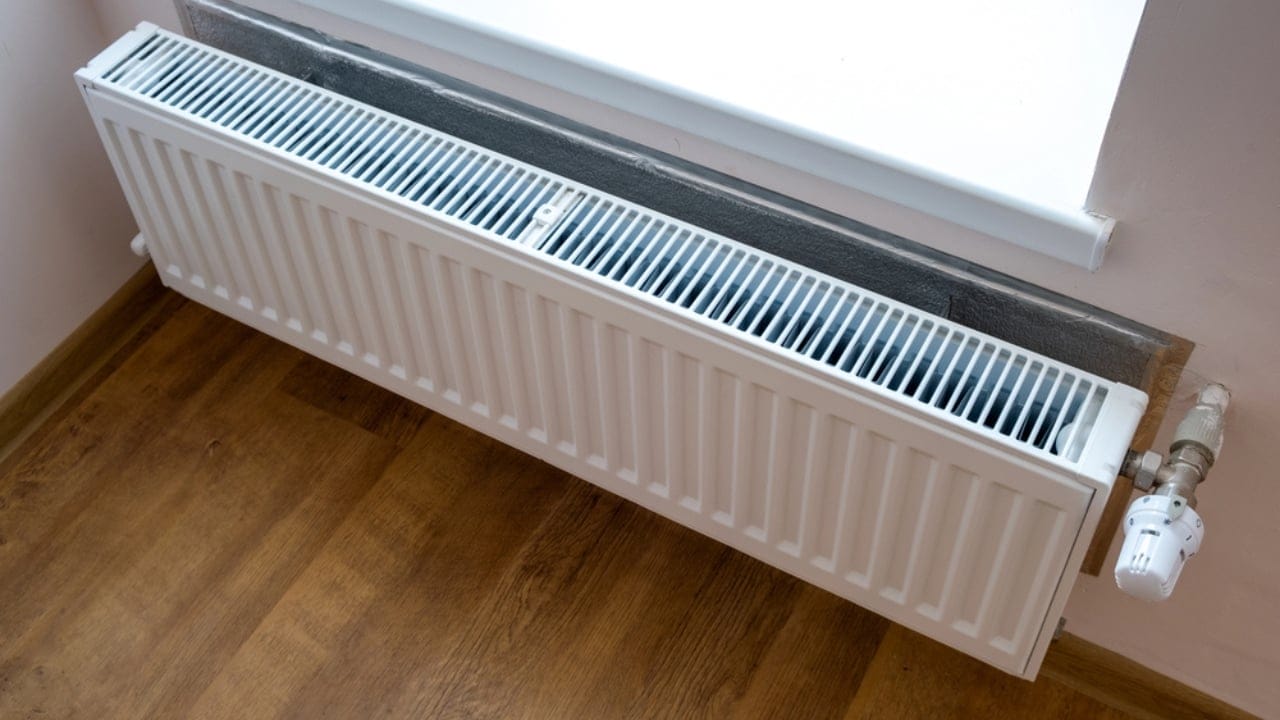 13 Clever Ways to Dry Clothes Indoors Without a Dryer - radiator airer dp321085282