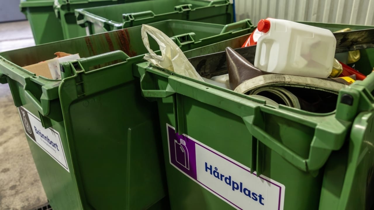 Maximize Your Garage Space with These 18 Simple DIY Organization Projects - recycle bin in garage ss2369130559