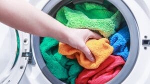 10 Common Mistakes You're Probably Making When Washing Your Towels 1 10 Common Mistakes You're Probably Making When Washing Your Towels - towel in washing machine ss259943081