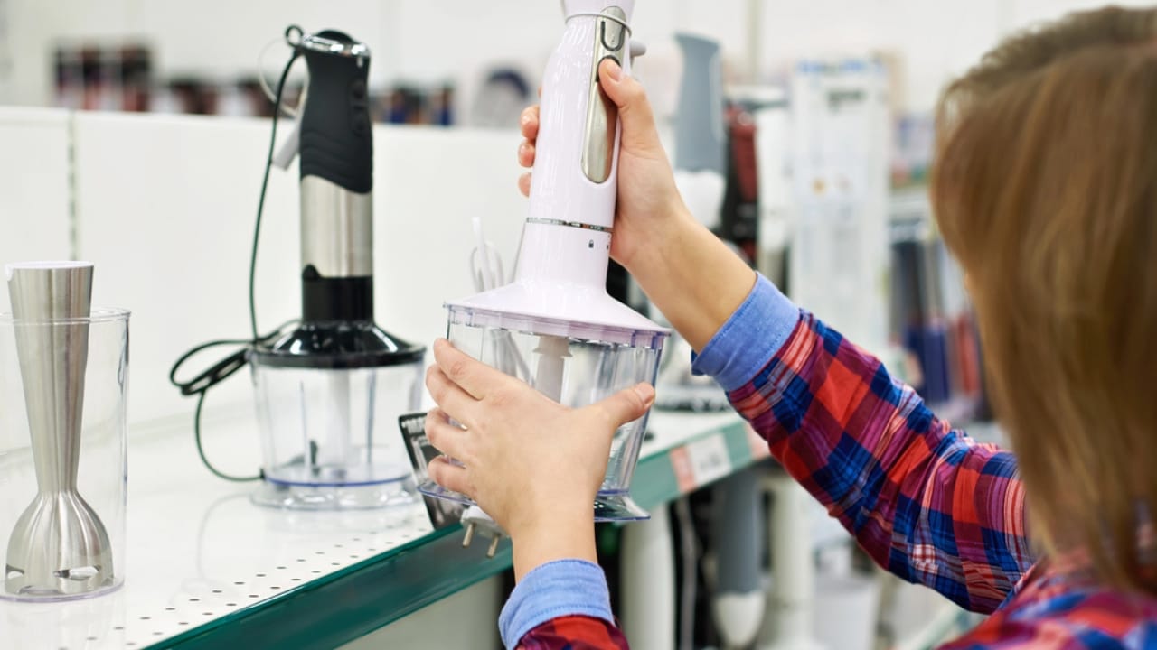 Quality Over Quantity: 20 Home Essentials You Should Never Scrimp On 5 Quality Over Quantity: 20 Home Essentials You Should Never Scrimp On - woman choosing blender dp103522164