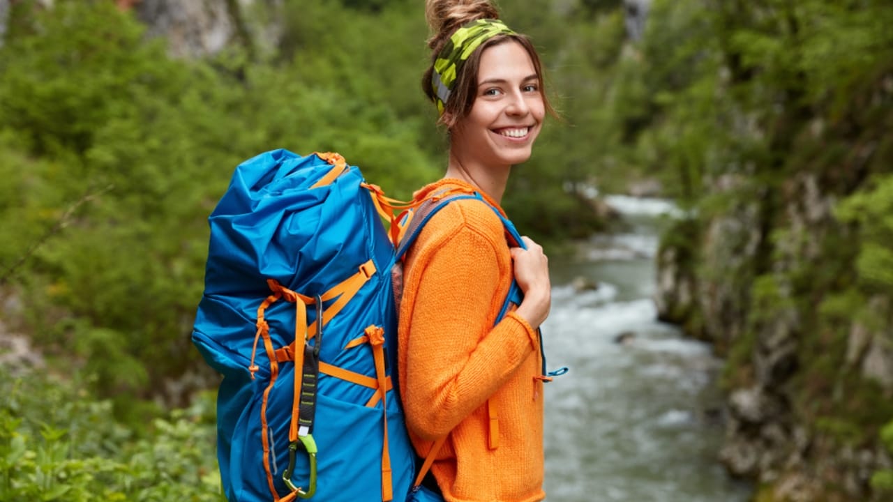 54% of Americans Face Disaster Risks: 18 Goodwill Essentials for Budget Survival Kits - woman hiking bagpack ss1407579254