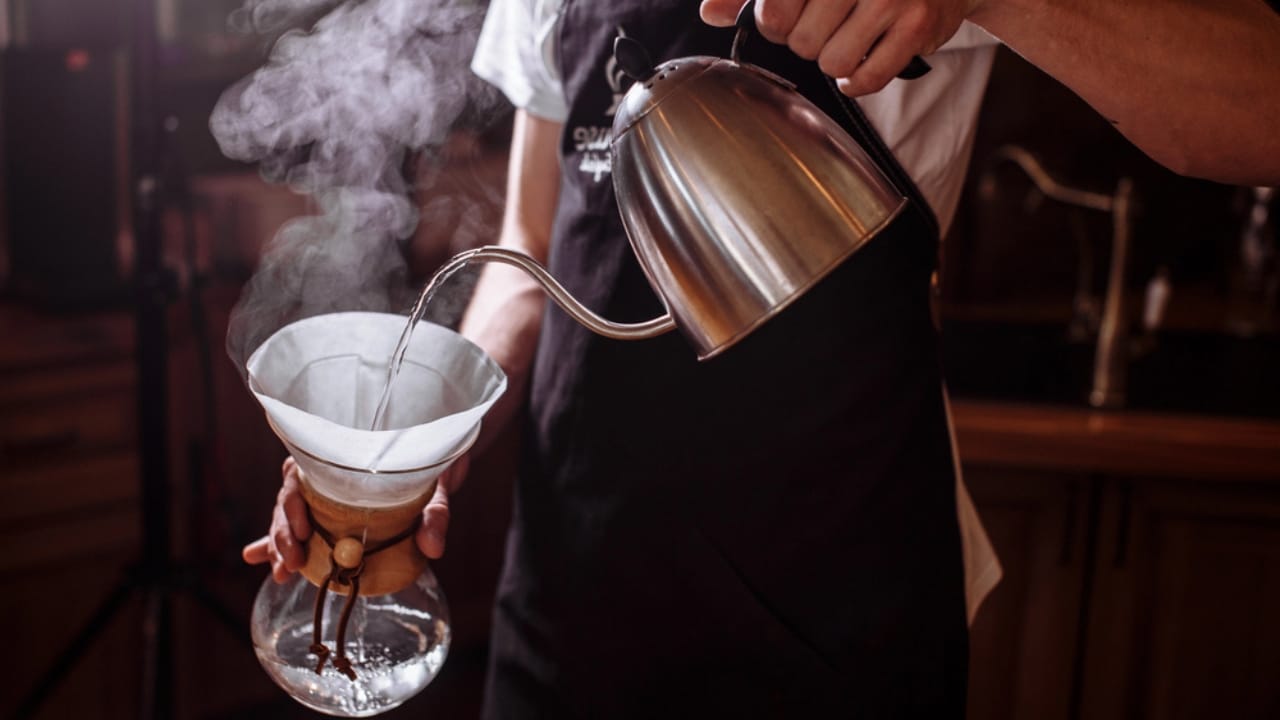 More Than Just for Coffee: 25 Life-Saving Uses for Coffee Filters 2 More Than Just for Coffee: 25 Life-Saving Uses for Coffee Filters - woman pouring hot water coffee filter dp207204528