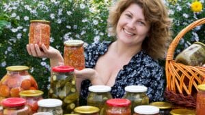 15 Canning Mistakes You Can’t Afford to Make 1 15 Canning Mistakes You Can’t Afford to Make - woman with canning dp31825375