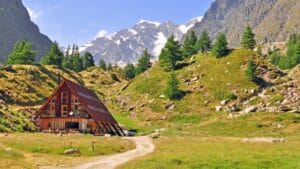 Want Mountain Living on a Budget? These 12 Towns Deliver 1 Want Mountain Living on a Budget? These 12 Towns Deliver - wooden house in mountain ss1048110166