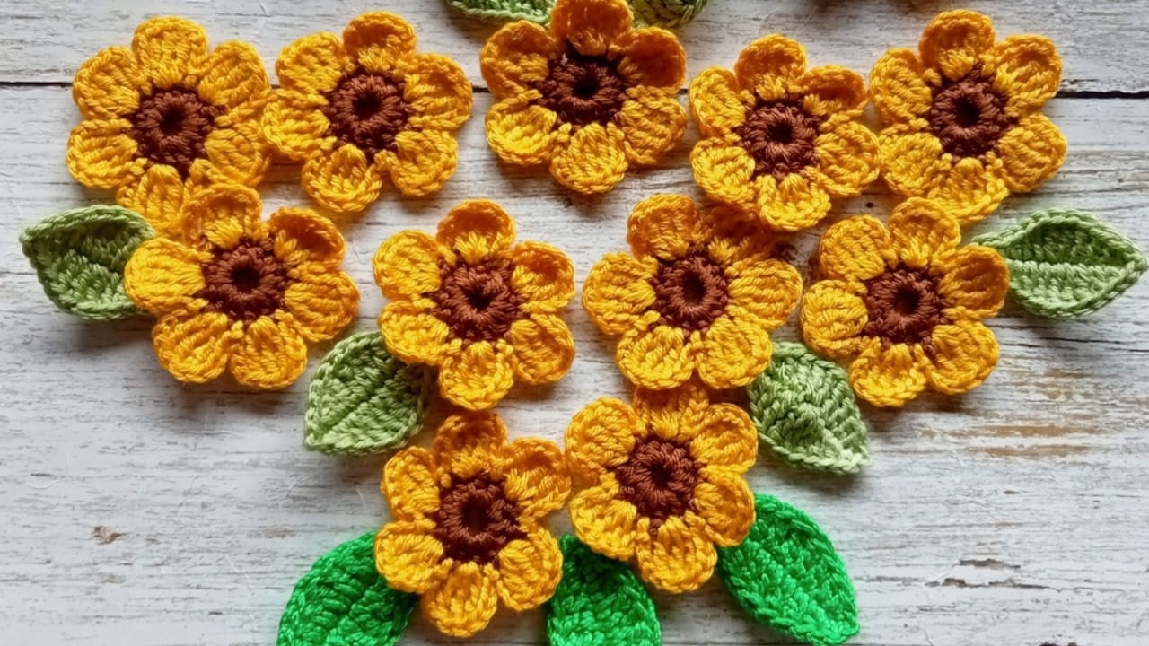 Don’t Toss That Yarn: 15 Creative Uses for Your Leftover Scraps 12 Don’t Toss That Yarn: 15 Creative Uses for Your Leftover Scraps - yarn flowers ss2512294427