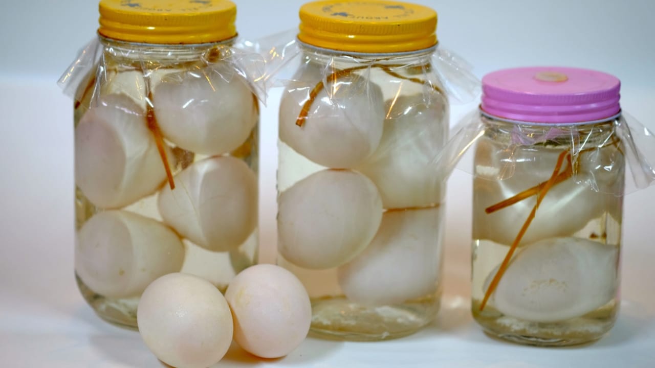 22 Egg Storage Hacks That Actually Work - Brine Duck Eggs in Glass Jar ss1815721226 dpdgm