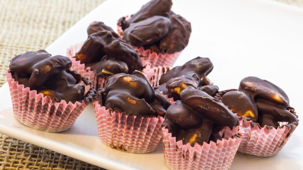 20 Homemade Holiday Candies That Will Sweeten Your Season 22 20 Homemade Holiday Candies That Will Sweeten Your Season - Dark Chocolate Almond Clusters dp17614339 dnoh