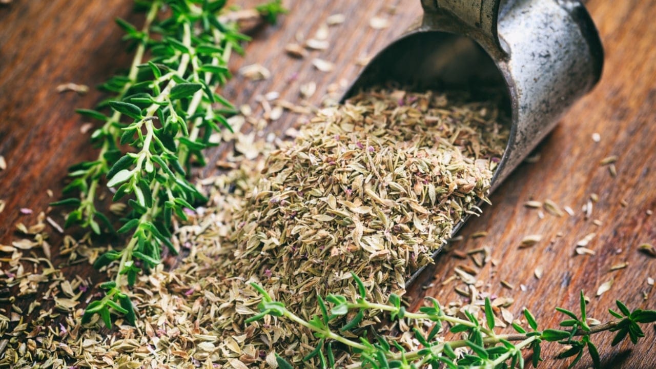 11 Herbs to Dry Now for Freshness That Lasts All Year - Fresh and dried thyme dp126543012 dnoh