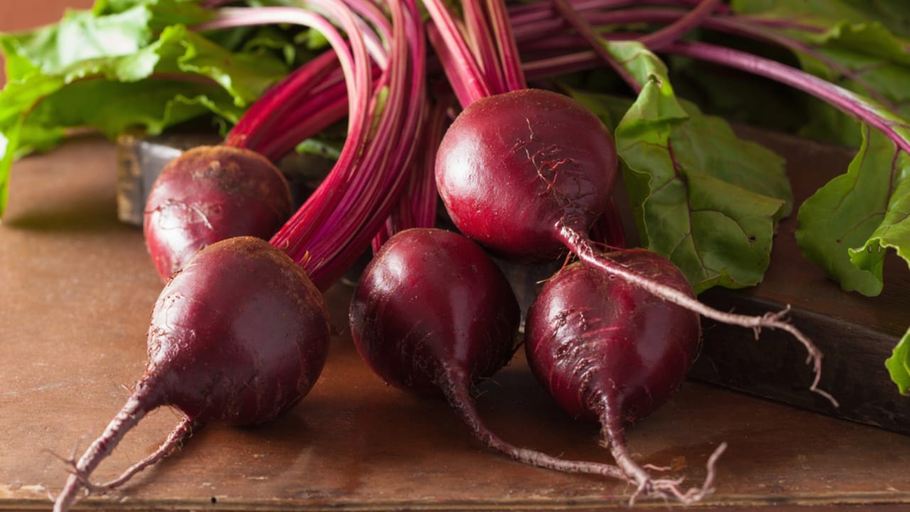 15 Easiest Vegetables to Grow in a Backyard Vegetable Garden 15 15 Easiest Vegetables to Grow in a Backyard Vegetable Garden - Fresh beetroot on wooden background dp55521083 dnoh