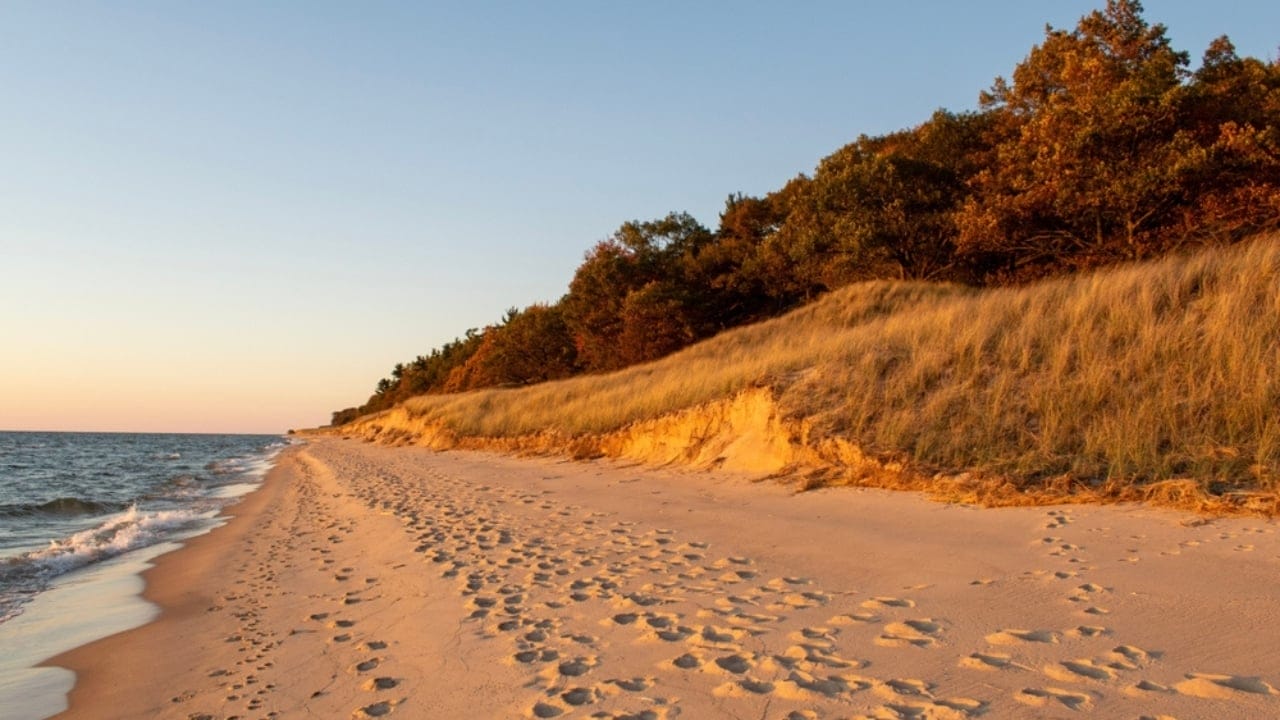 The Most Interesting Fact About Each of the 50 States 23 The Most Interesting Fact About Each of the 50 States - Lake Michigan Beach at Sunset ss2183338207 adyh