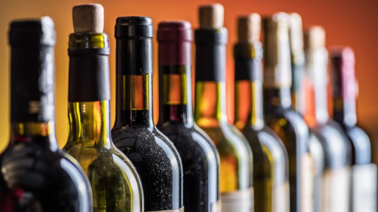 16 Foods You’d Never Guess Freeze Well—But They Do 17 16 Foods You’d Never Guess Freeze Well—But They Do - Line of wine bottles dp191579352 dnoh