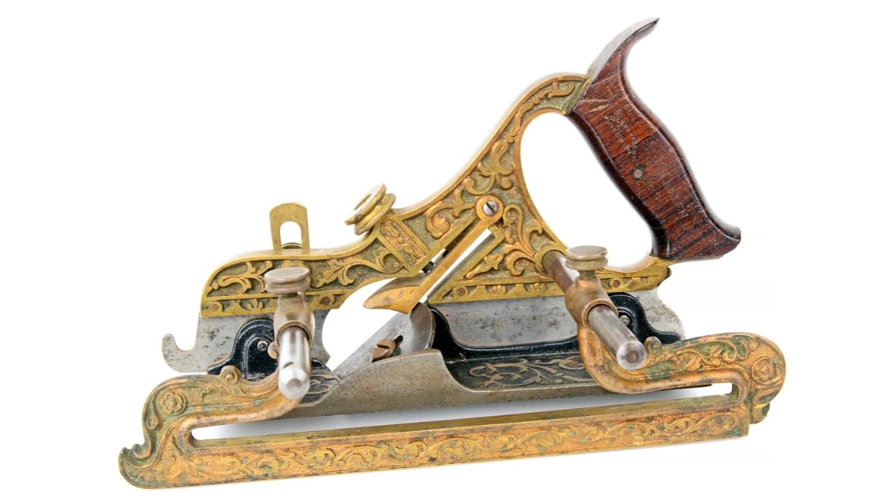 15 Antique Woodworking Tools That Could Be Worth a Fortune 9 15 Antique Woodworking Tools That Could Be Worth a Fortune - Millers Patent Plane No. 42 Gunmetal Ornate Plow Plane