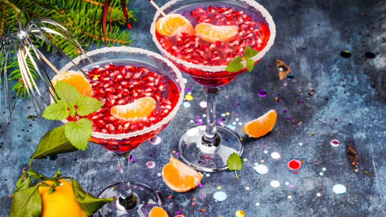 Holiday Fun Without Booze: 12 Easy Mocktail Recipes to Try 9 Holiday Fun Without Booze: 12 Easy Mocktail Recipes to Try - Non Alcoholic Pomegranate Christmas Punch ss1223319943 dpdgm