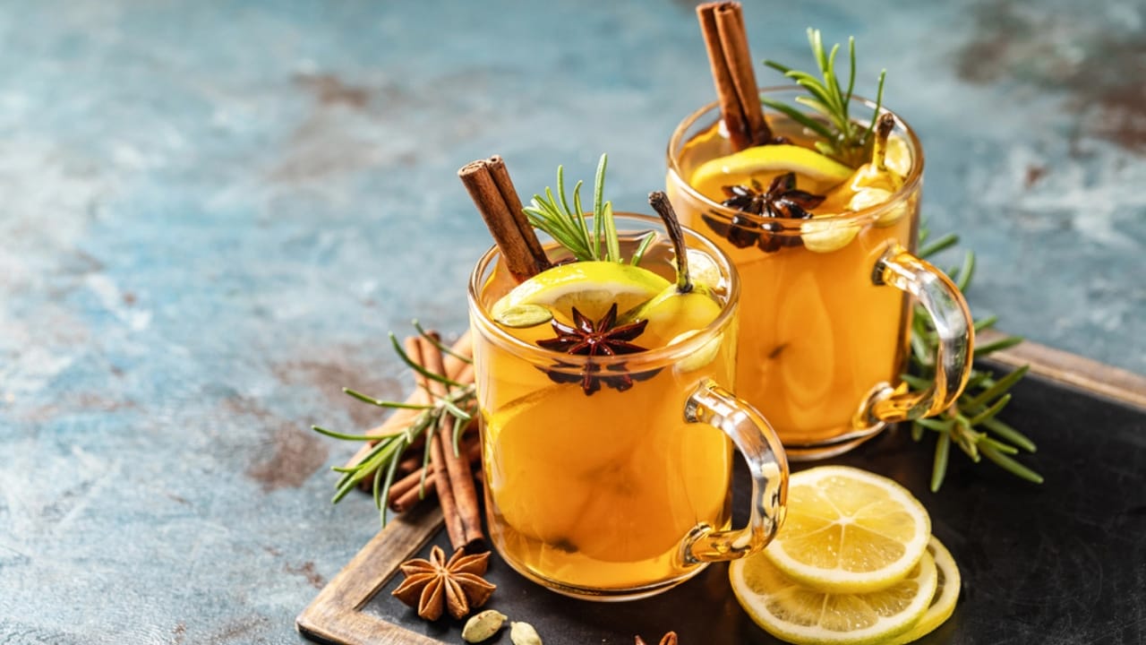 Holiday Fun Without Booze: 12 Easy Mocktail Recipes to Try 7 Holiday Fun Without Booze: 12 Easy Mocktail Recipes to Try - Non Alcoholic Thanksgiving Punch with Pear dp321347988 dnoh