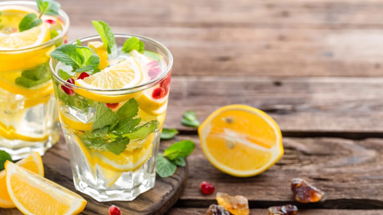 Holiday Fun Without Booze: 12 Easy Mocktail Recipes to Try 8 Holiday Fun Without Booze: 12 Easy Mocktail Recipes to Try - Pomegranate Lemonade dp142335744 dnoh