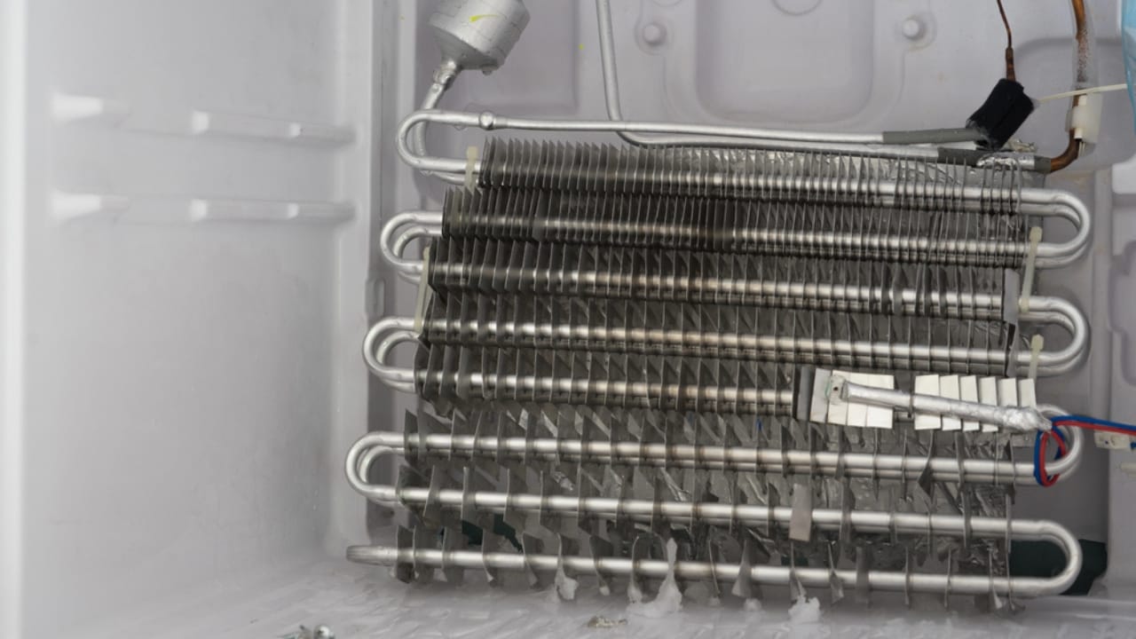 20 DIY Fixes Anyone Can Do to Save Money 18 20 DIY Fixes Anyone Can Do to Save Money - Refrigerator Coils dp154002132 dnoh