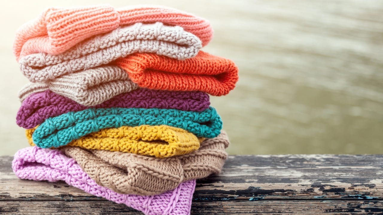 25 Creative DIY Gifts for a Memorable Holiday Season 7 25 Creative DIY Gifts for a Memorable Holiday Season - Rows of colorful knitted hats dp220218552 dnoh