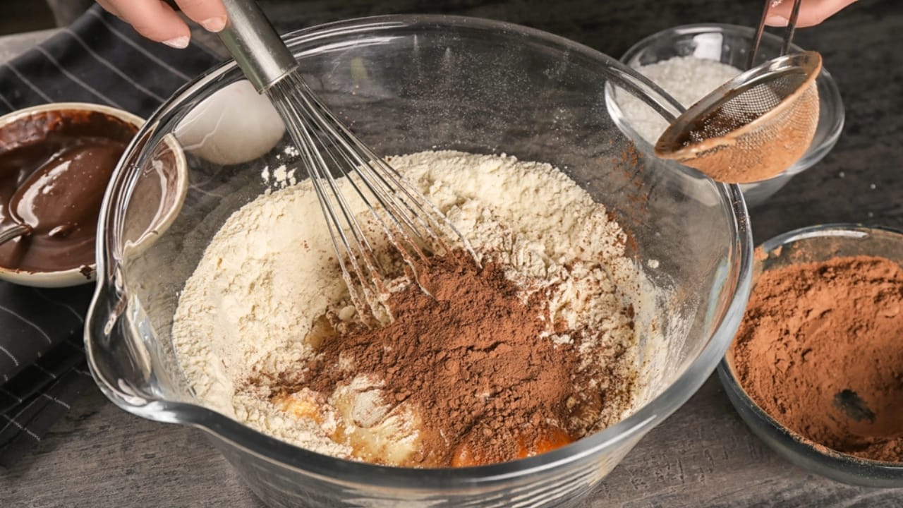 Ditch the Box: 17 Foods That Taste Better Homemade 4 Ditch the Box: 17 Foods That Taste Better Homemade - Woman preparing dough for brownies dp150323936 dnoh