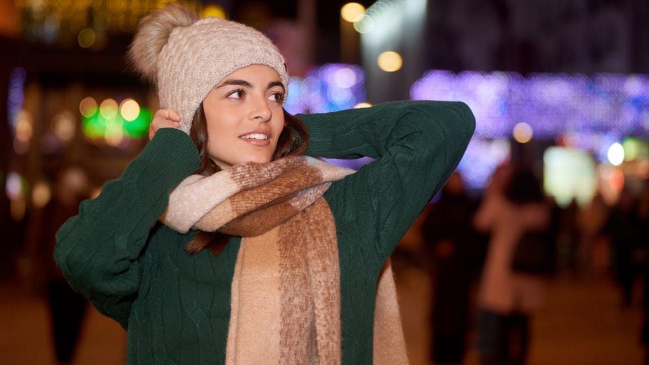 13 Ways to Stay Warm Without Cranking the Heat 2 13 Ways to Stay Warm Without Cranking the Heat - Woman wearing winter clothes dp647975428 dnoh