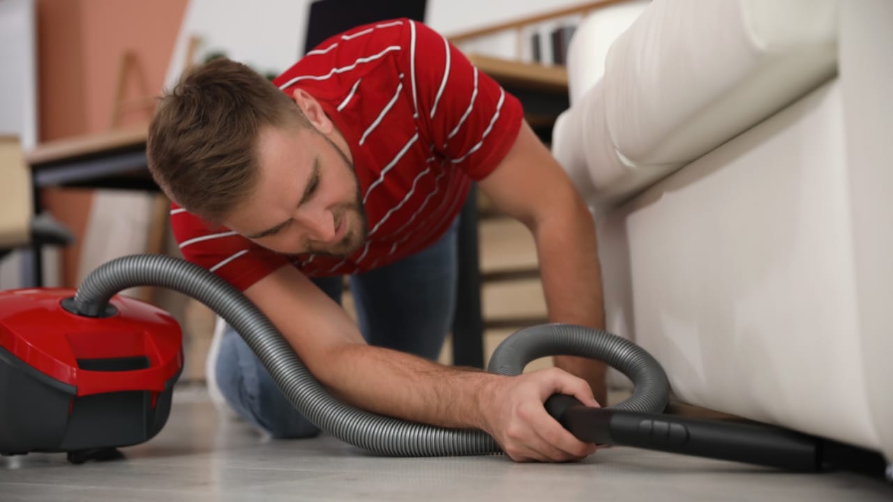 Don’t Toss Them... 15 Creative Ways to Reuse Pantyhose 4 Don’t Toss Them... 15 Creative Ways to Reuse Pantyhose - Young man using vacuum cleaner dp437217522 dnoh