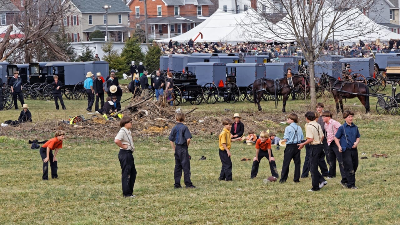 13 Amish Money-Saving Habits to Cut Your Household Costs 10 13 Amish Money-Saving Habits to Cut Your Household Costs - amish boys playing football dp147361491 dnoh