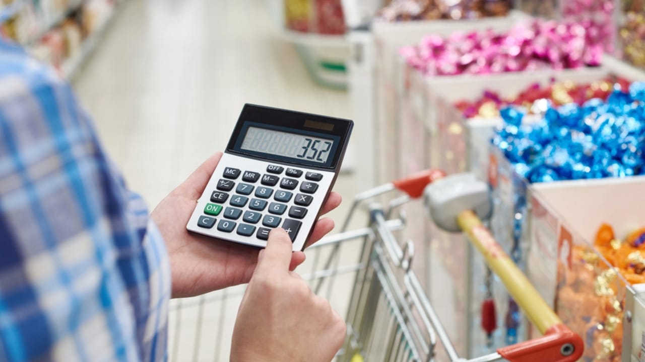 Beat Inflation at the Checkout: 16 Ways to Save on Groceries 11 Beat Inflation at the Checkout: 16 Ways to Save on Groceries - calculator in supermarket ss65717637 dpdgm