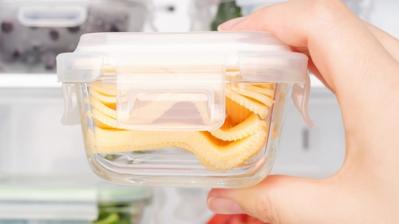 Stop Wasting Cheese: 5 Plastic-Free Ways to Keep It Fresh 5 Stop Wasting Cheese: 5 Plastic-Free Ways to Keep It Fresh - cheese in container ss2386352647