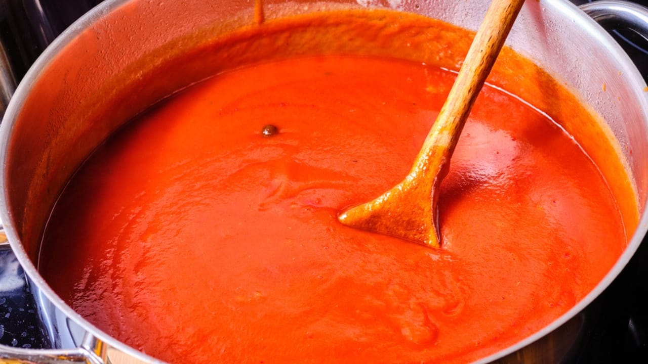 25 Genius Kitchen Tricks for Faster, Cheaper Meals 4 25 Genius Kitchen Tricks for Faster, Cheaper Meals - czech tomato sauce in cooking pot dp425440004 dnoh