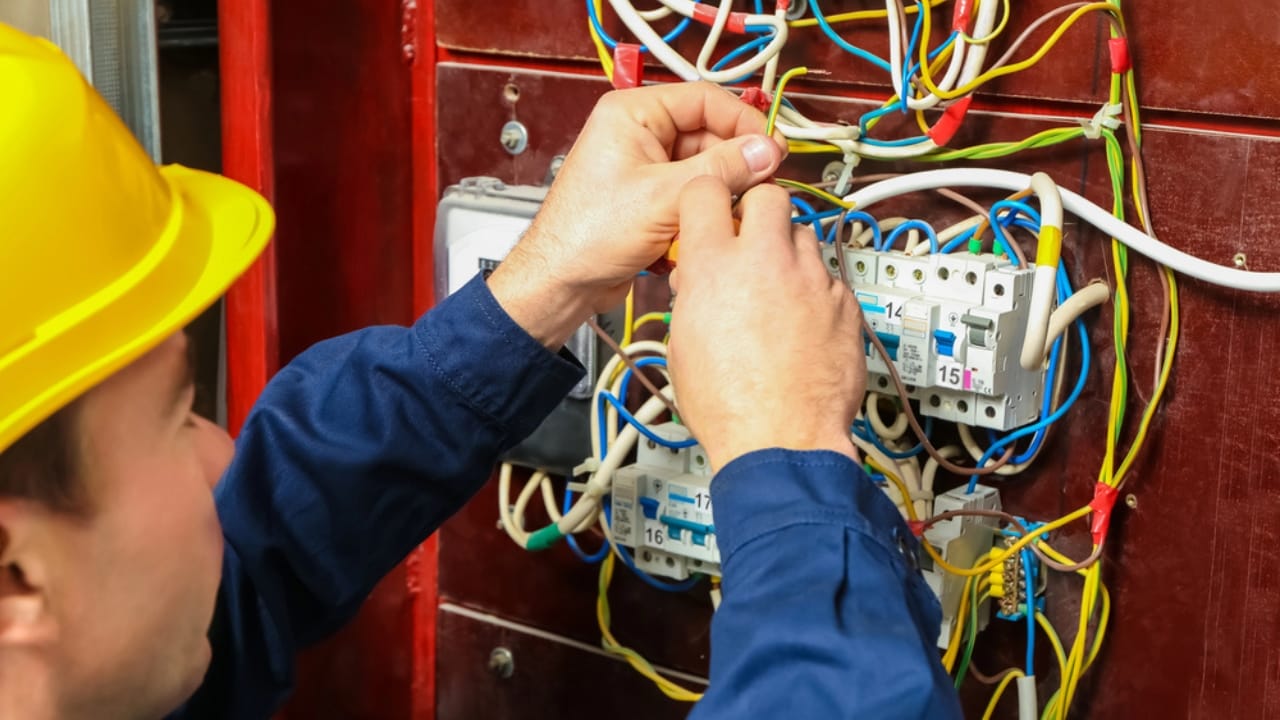 16 Home Projects That Could Land You in Legal Trouble 2 16 Home Projects That Could Land You in Legal Trouble - electrician connecting wires dp139934266 dnoh