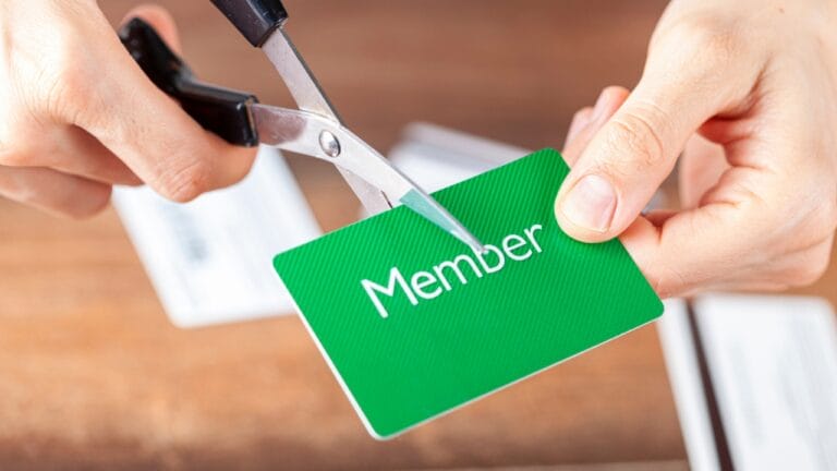 14 Everyday Luxuries Americans Are Cutting to Fight Inflation 9 14 Everyday Luxuries Americans Are Cutting to Fight Inflation - hand cutting membership card dp453592678 dnoh