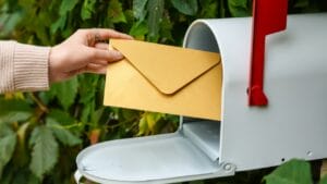 Dryer Sheets in Mailboxes? A Mail Carrier Explains 1 Dryer Sheets in Mailboxes? A Mail Carrier Explains - letter from mailbox outdoors ss2154544229 dpdgm