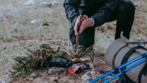 20 Skills Everyone Should Master in Uncertain Times 1 20 Skills Everyone Should Master in Uncertain Times - man setting fire on camp ss2046931925