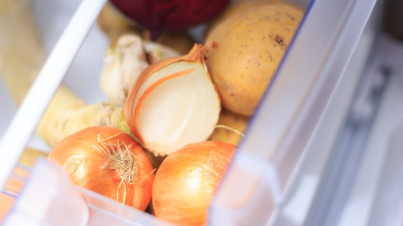 Beat Spoilage: How to Keep Onions Fresh for Months - onion in the open fridge drawer ss1328050283 dnoh