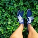 Say Goodbye to Weeds with These 15 Creeping Garden Path Plants 6 Say Goodbye to Weeds with These 15 Creeping Garden Path Plants - person standing on lush green clover field ss2409975277 adyh