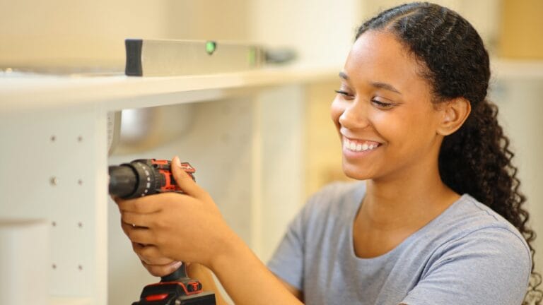 20 DIY Fixes Anyone Can Do to Save Money 8 20 DIY Fixes Anyone Can Do to Save Money - woman homeowner diy ss2473373585degm