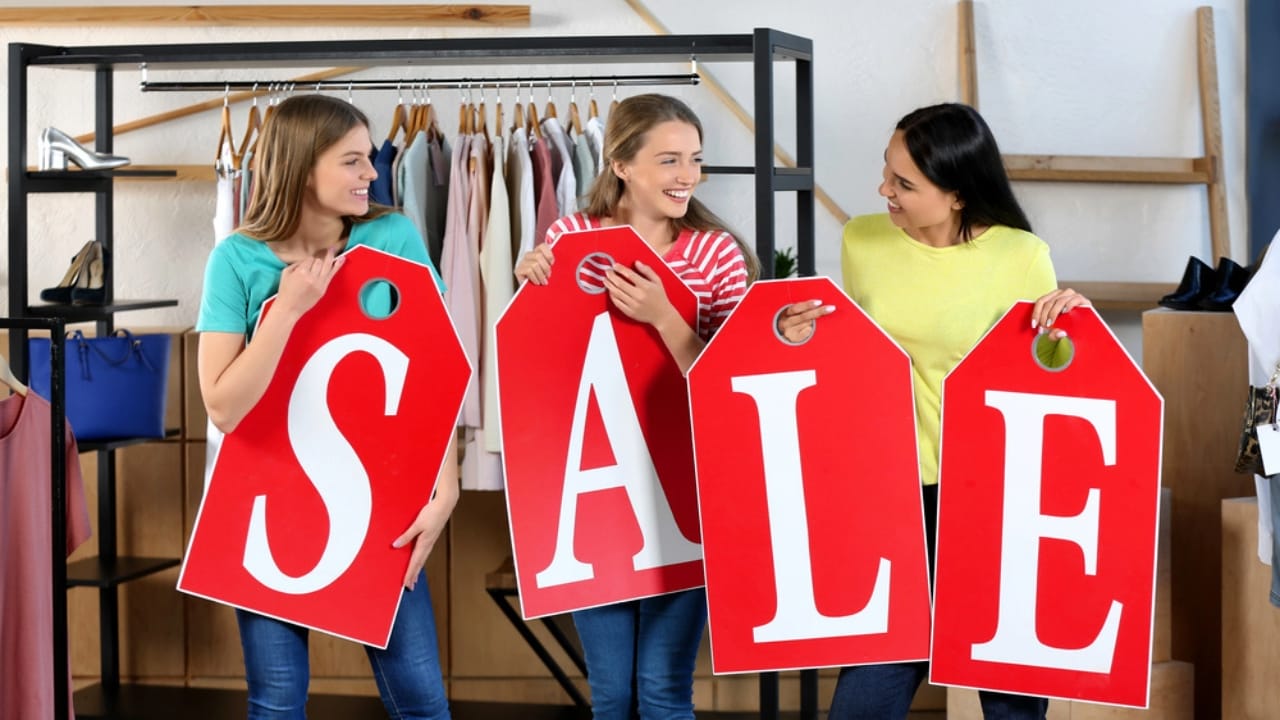 Beat Inflation at the Checkout: 16 Ways to Save on Groceries 3 Beat Inflation at the Checkout: 16 Ways to Save on Groceries - women with big tags composing word SALE dp212148666 dnoh