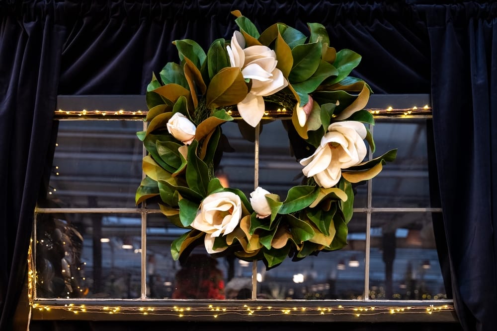 25 Unique Christmas Wreaths to Elevate Your Holiday Decor 9 25 Unique Christmas Wreaths to Elevate Your Holiday Decor - wreath made of artificial magnolia flowers and leaves ss2392574579 dpdgm