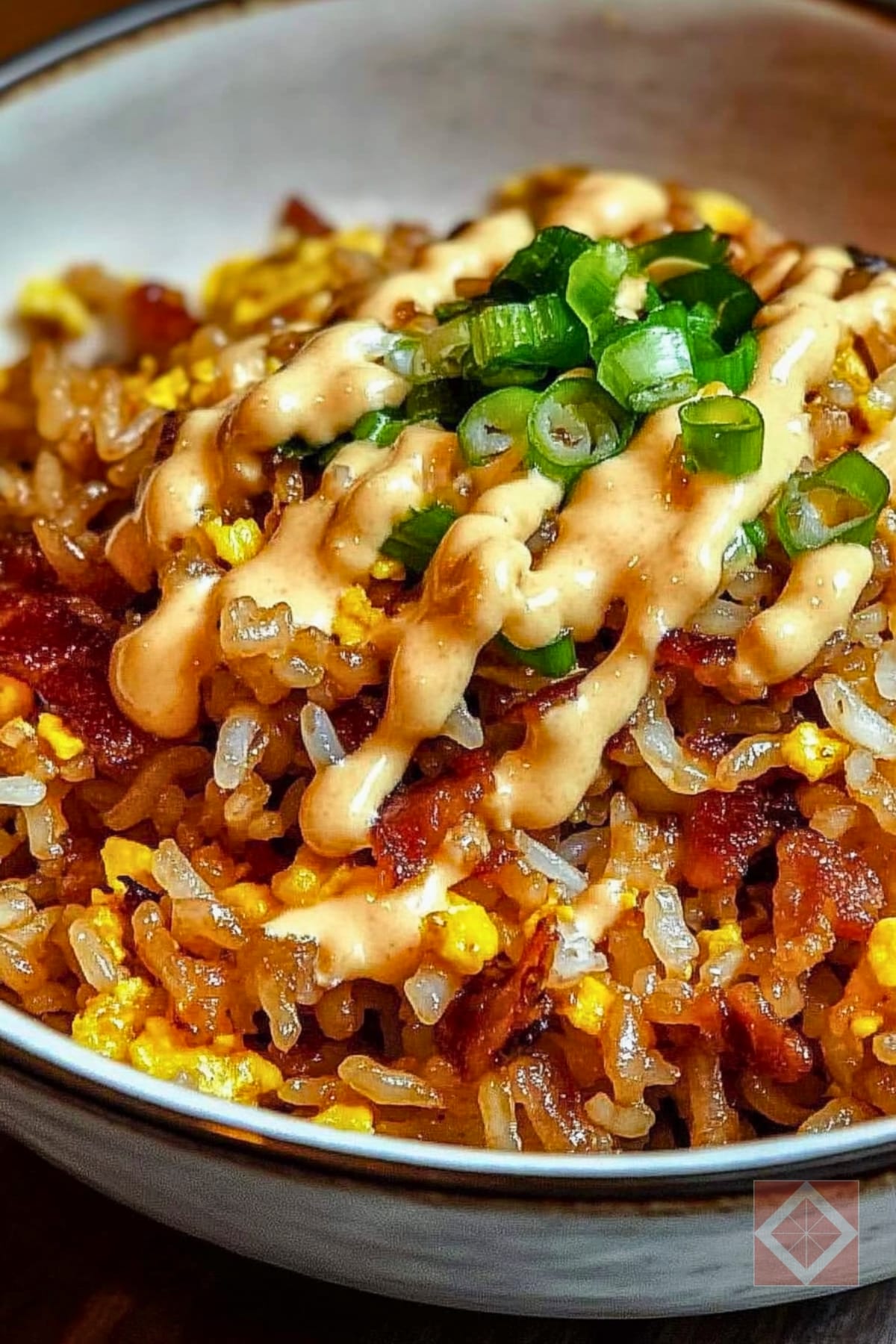 17 Must-Try Blackstone Recipes That Will Elevate Your Griddle Game 13 17 Must-Try Blackstone Recipes That Will Elevate Your Griddle Game - Bacon Fried Rice With Spicy Mayo pin 1 midia