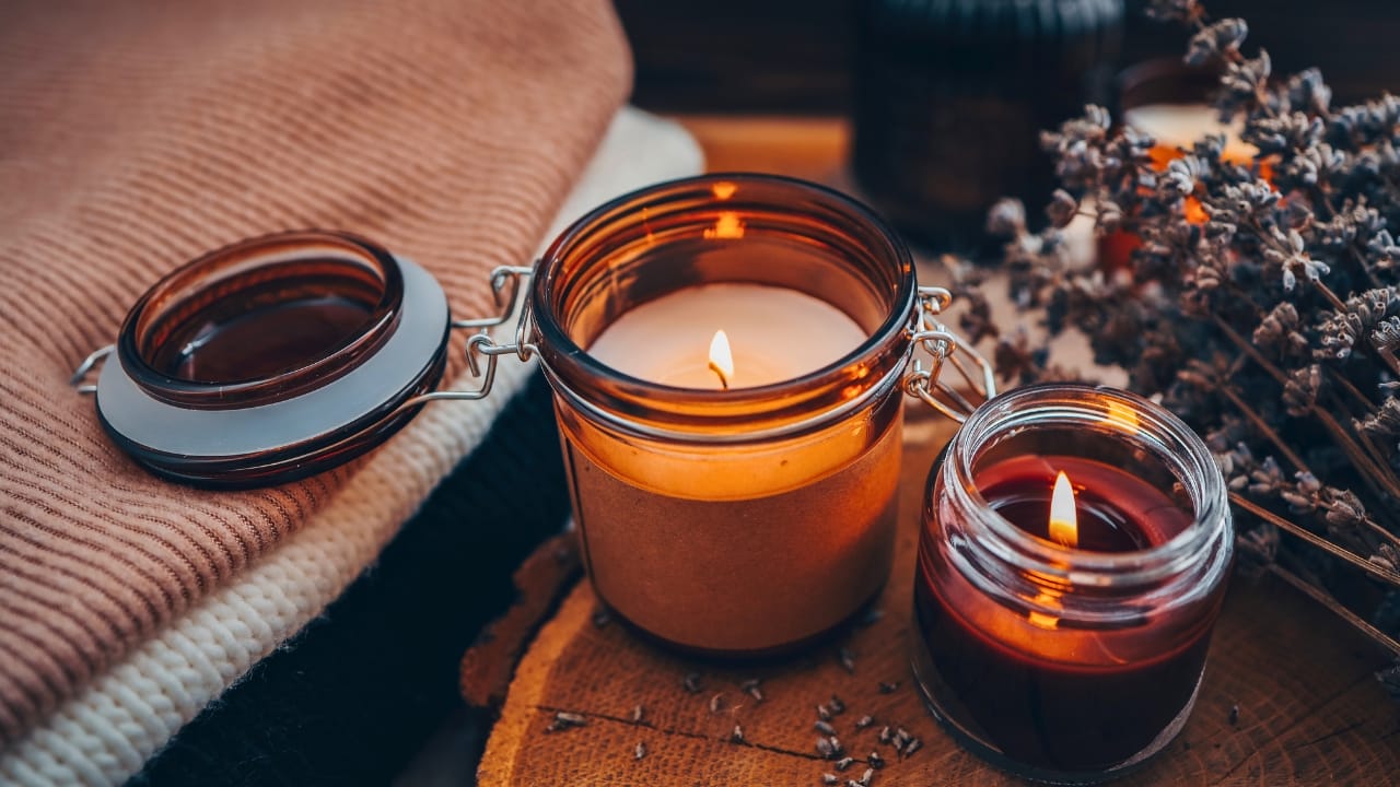 You’re Probably Burning Candles Wrong—Here’s How to Fix It 9 You’re Probably Burning Candles Wrong—Here’s How to Fix It - Burning candles book and lavender ss2198559521 degm