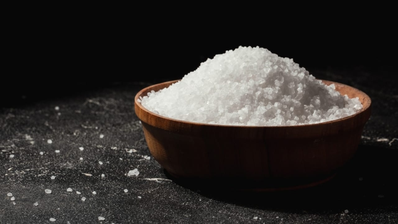 Beat Window Condensation with a Simple Salt Bowl Trick 6 Beat Window Condensation with a Simple Salt Bowl Trick - Coarse white salt in a wooden bowl ss2265635303 dpdgm