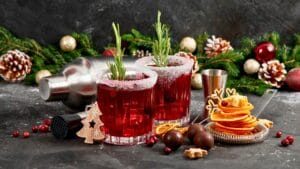 Holiday Fun Without Booze: 12 Easy Mocktail Recipes to Try 1 Holiday Fun Without Booze: 12 Easy Mocktail Recipes to Try - Cranberry christmas cocktail with rosemary ss2379833053 degm