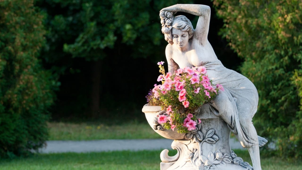 Front Yard Upgrades: 25 Simple Landscaping Ideas That Add Value - Garden Sculpture dp443630418 dnoh