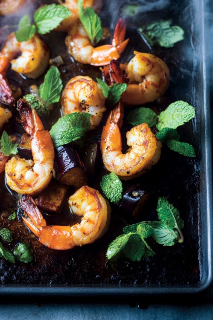 18 Irresistible Seafood Recipes for Fresh and Bold Dinner Ideas 11 18 Irresistible Seafood Recipes for Fresh and Bold Dinner Ideas - Spicy Roasted Shrimp With Eggplant Mint Pin