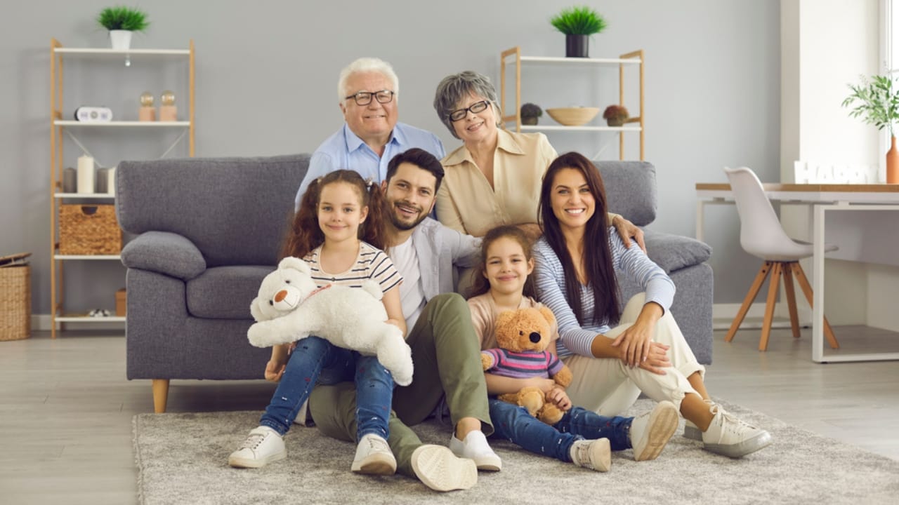 17 Reasons Baby Boomers Aren’t Joining the Downsizing Trend 6 17 Reasons Baby Boomers Aren’t Joining the Downsizing Trend - family with grandparents ss2006933963 dnoh