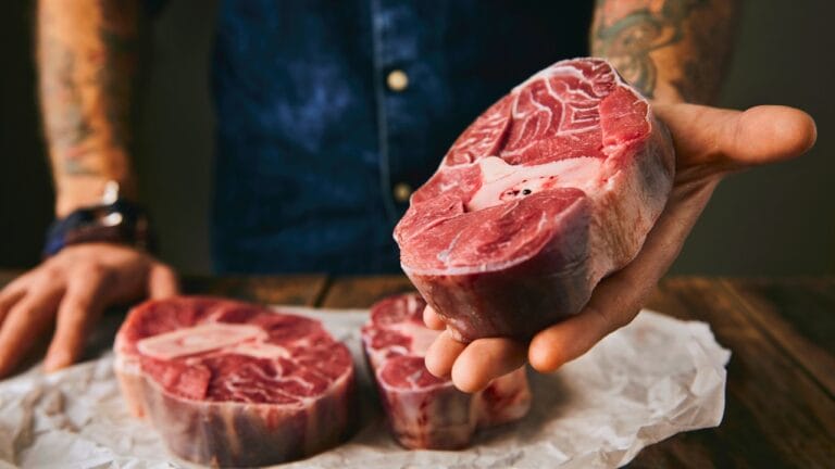 Carnivore Diet Under Fire: What Science Says About the Trend 2 Carnivore Diet Under Fire: What Science Says About the Trend - man holding meat carnivore. ss399990991 degm